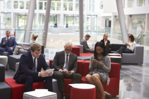 People In Busy Reception Area